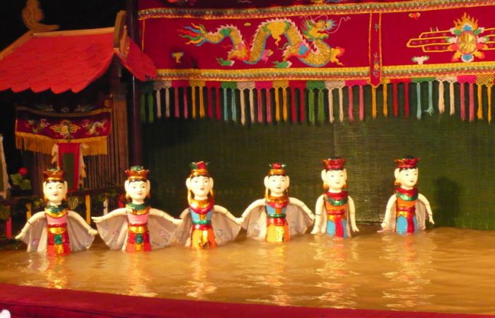 Private Evening Cyclo Tour with Water Puppet Show